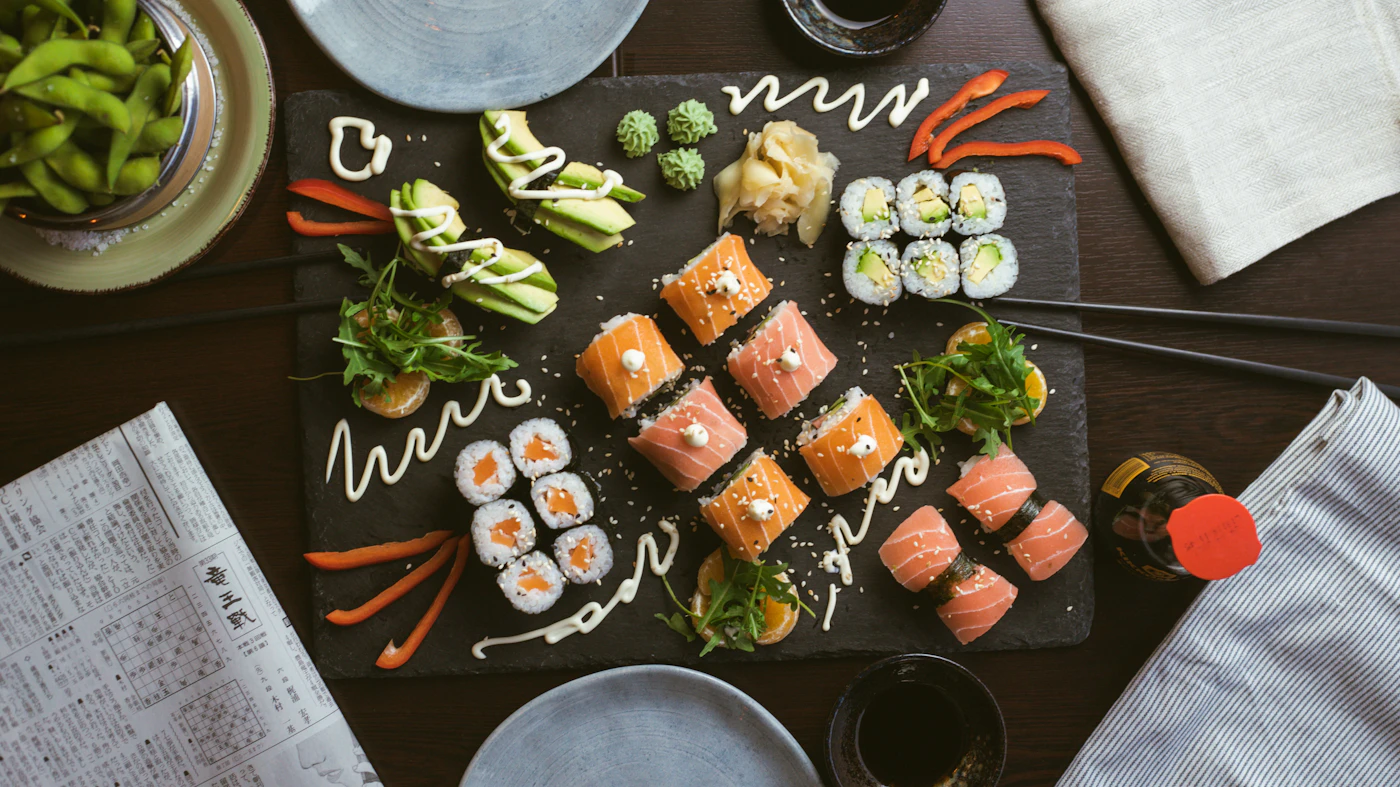 Sushi chef preparing nigiri by hand at Fifth Avenue Sushi